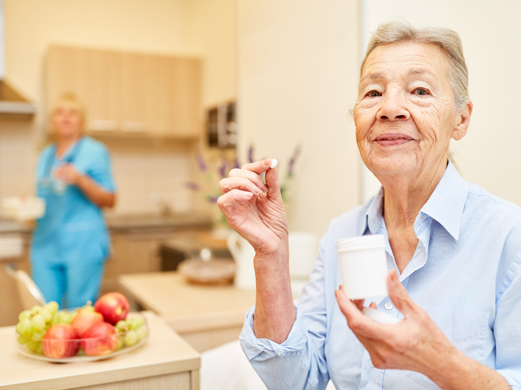 caregiver providing medication supervision